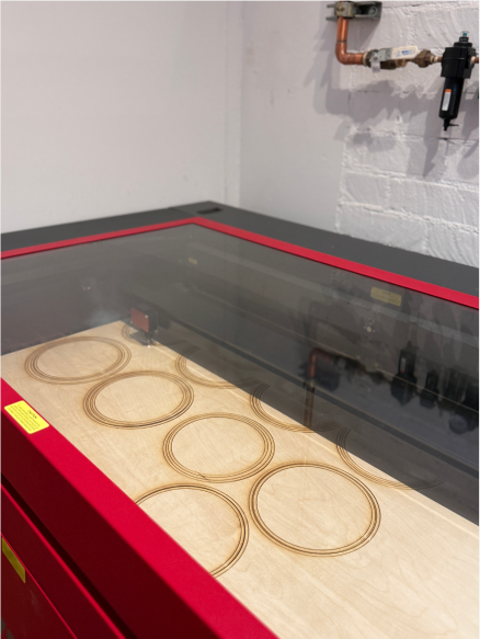 Laser-cut rings on the cutter bed